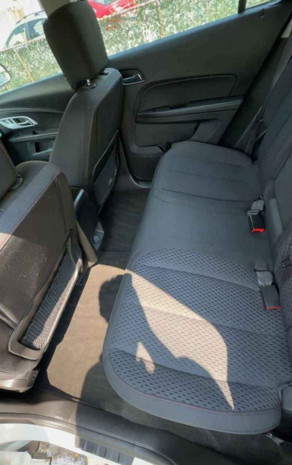 Back seat carpet clean and vacuumed